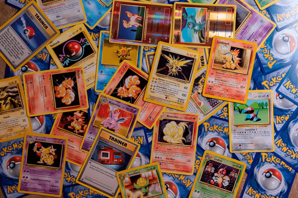 A spread of vintage Pokémon trading cards