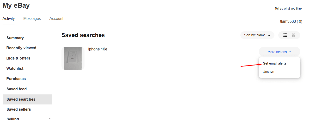 My eBay Saved searches page with the iphone 16e search and the More actions menu open on Get email alerts, marked with a red arrow